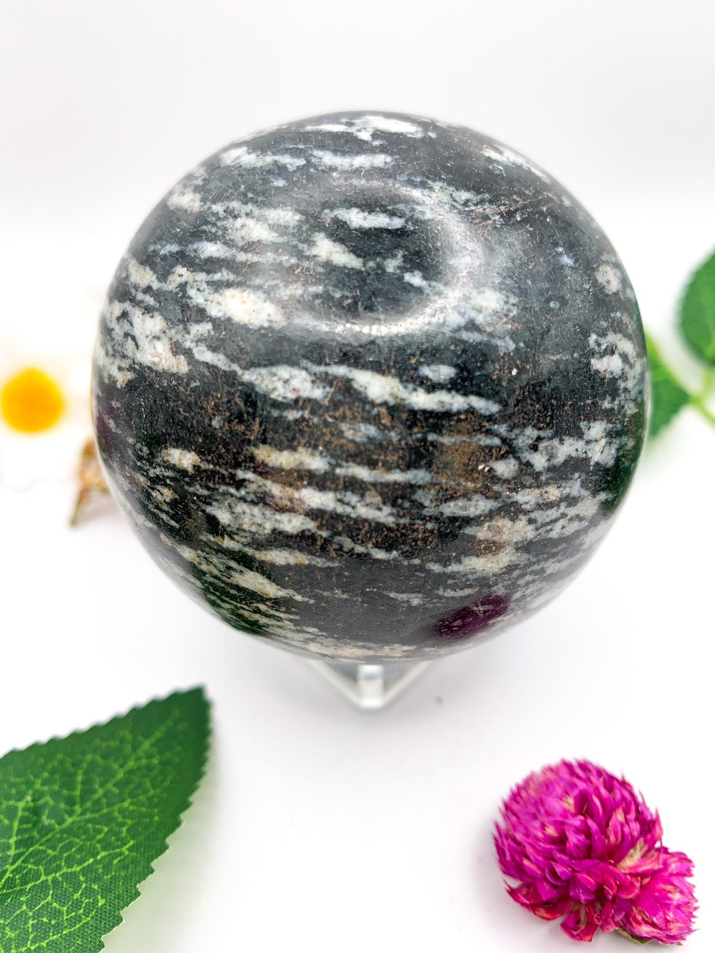 black rhodonite sphere