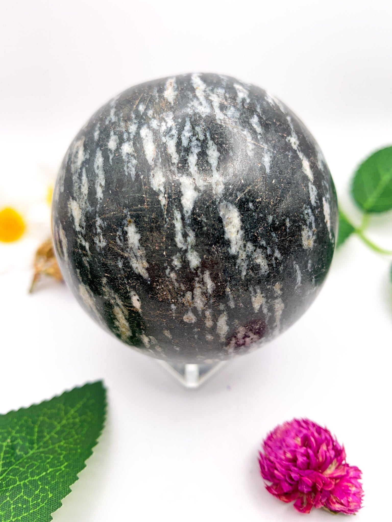 black rhodonite sphere