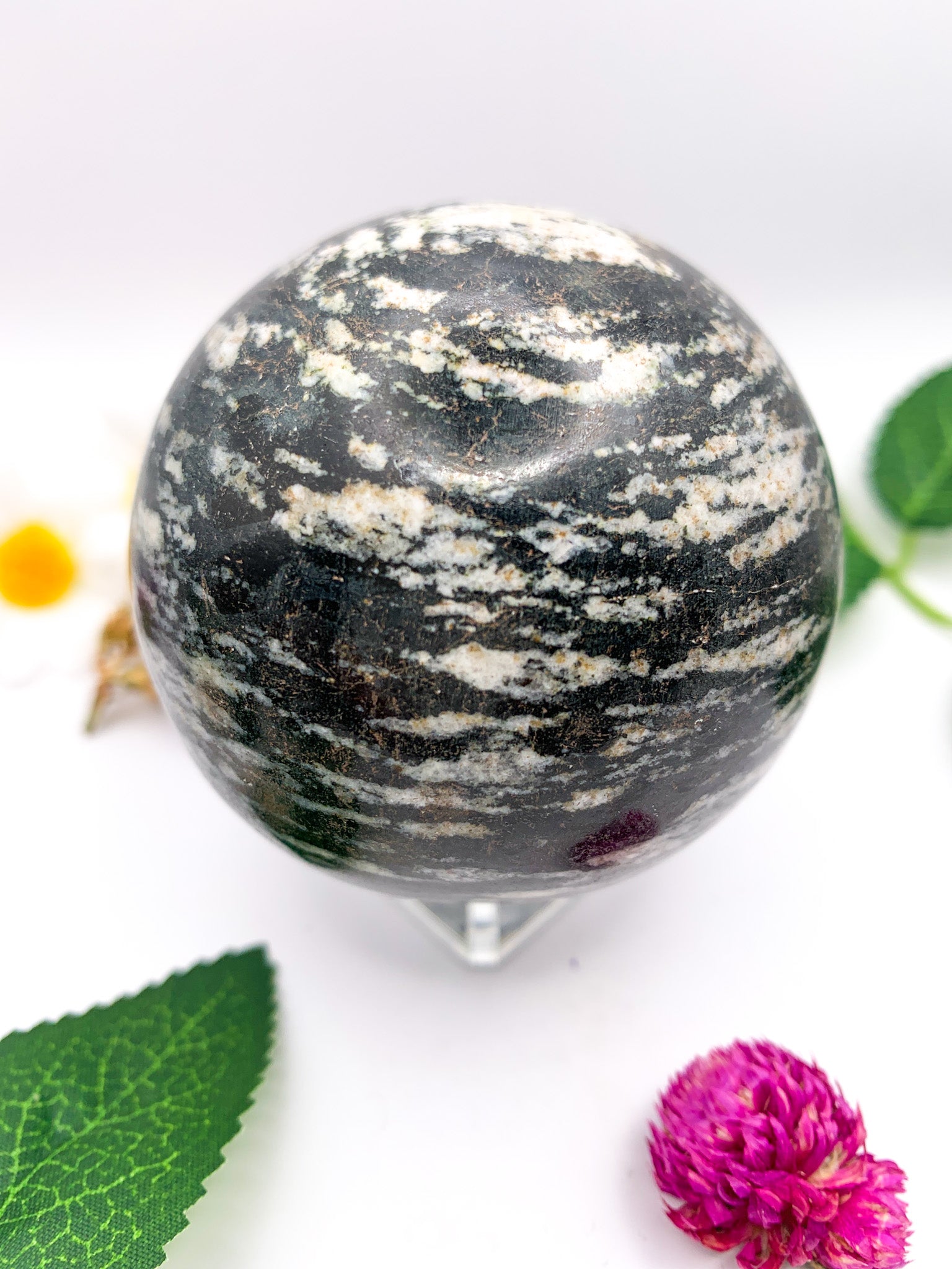 black rhodonite sphere