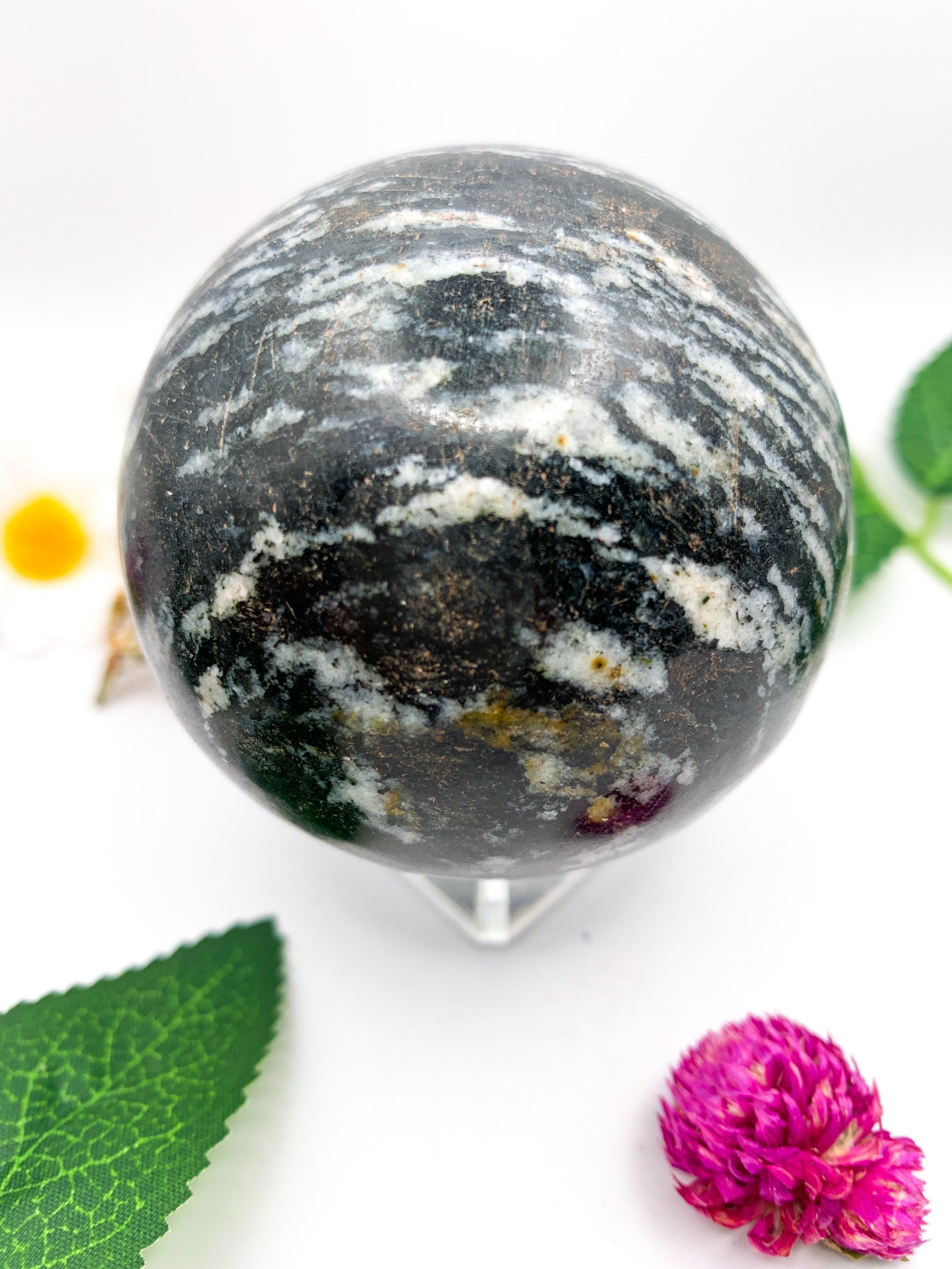 black rhodonite sphere